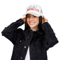 Red white and brunette hat